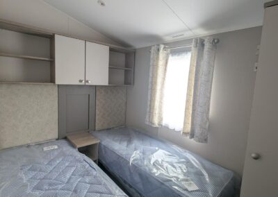 2026 Willerby Salisbury twin bedroom with two single beds and storage