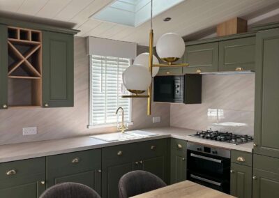 Swift Vendee Lodge green country-style kitchen with integrated appliances