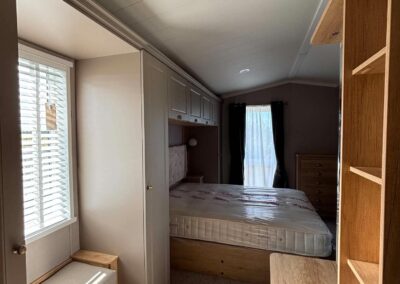 2026 Swift Vendee Lodge master bedroom with king-size bed and fitted wardrobes