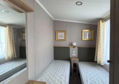 2026 Swift Vendee Lodge twin bedroom with fitted storage